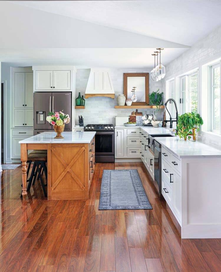 side view of modern Michigan farmhouse kitchen white with wood accents