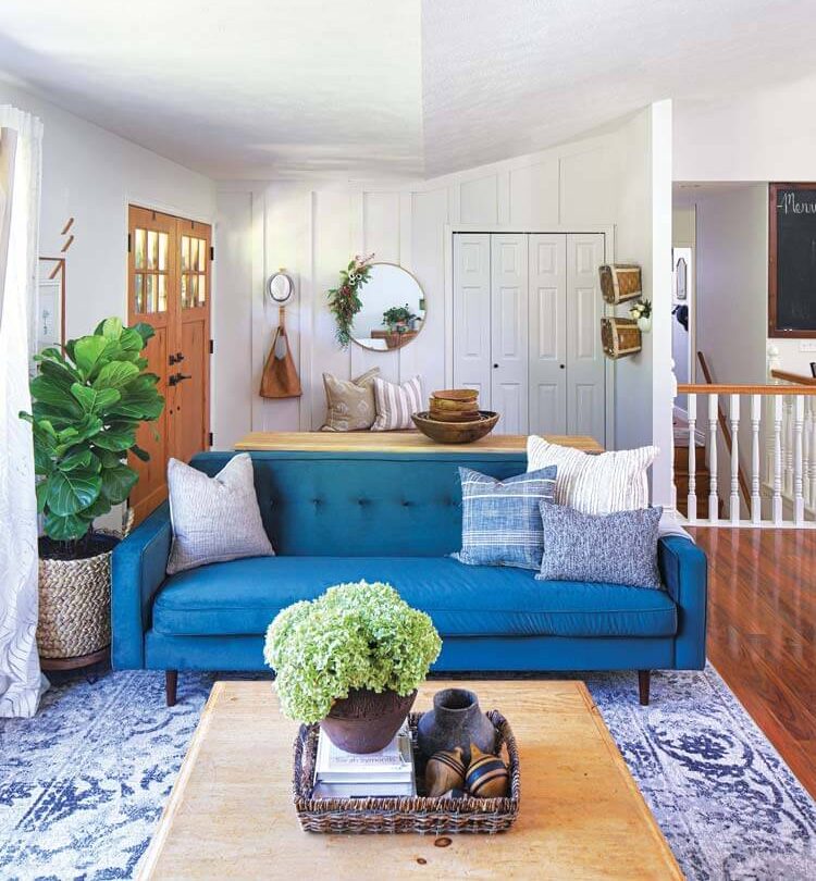 blue sofa and upcycled coffee table in Michigan farmhouse