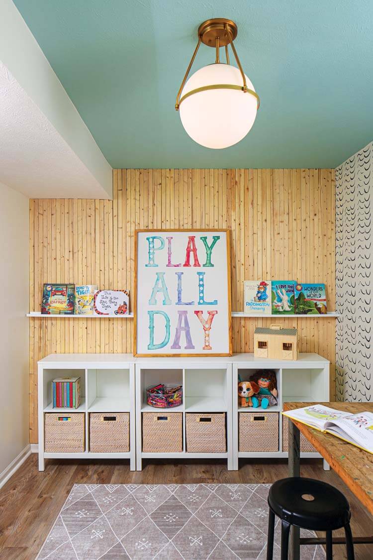 kids' playroom with wood accent wall