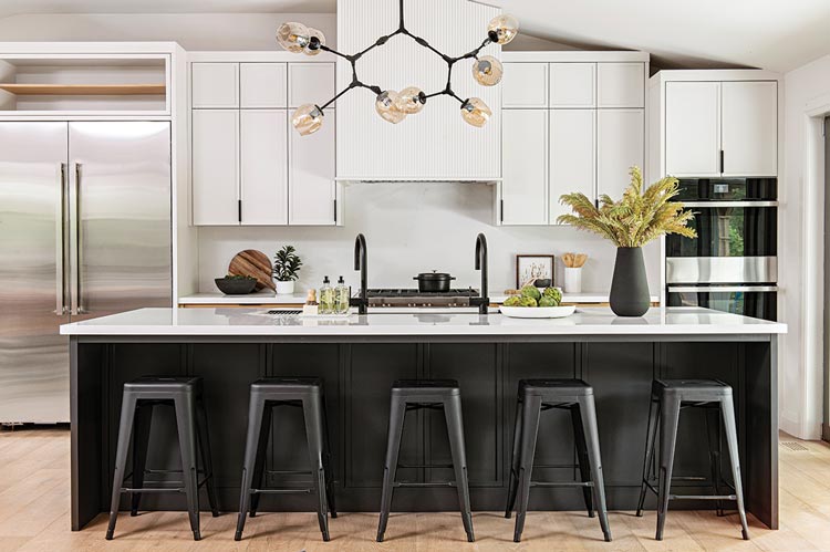 modern chandelier and double sink in black and white Scandinavian inspired kitchen