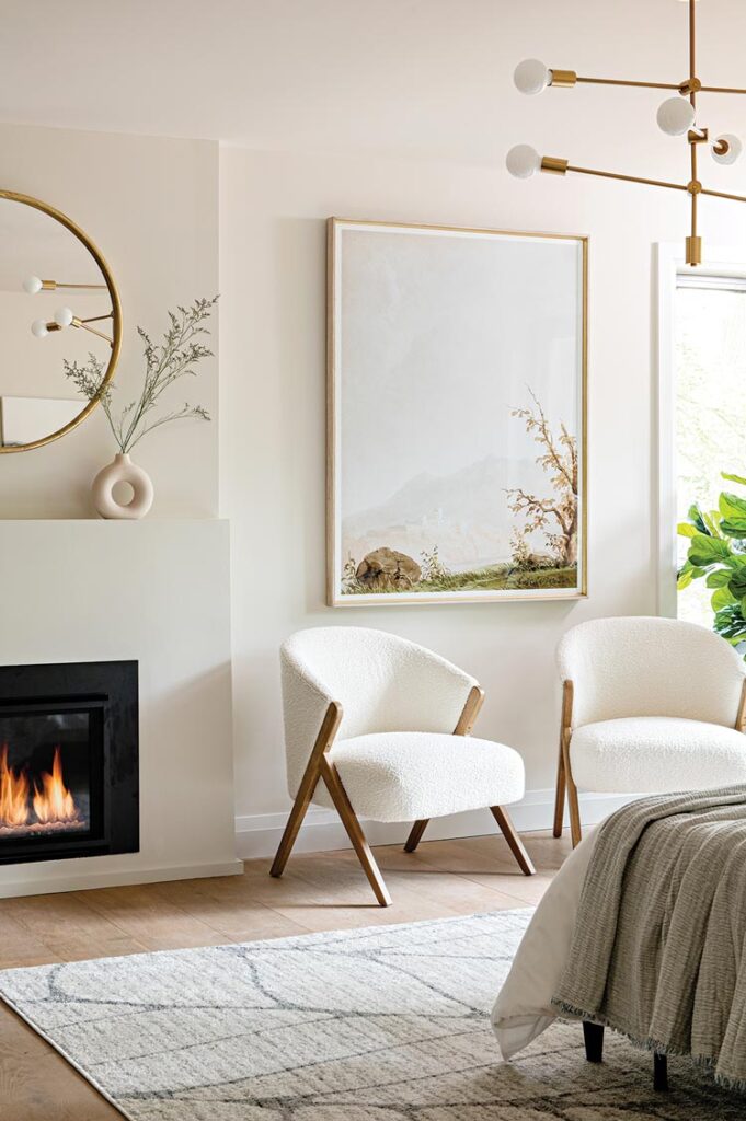 fireplace and white modern chairs in Scandinavian inspired home