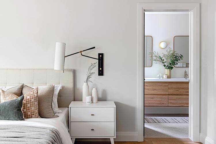 view to bathroom from master bedroom in Scandinavian inspired home