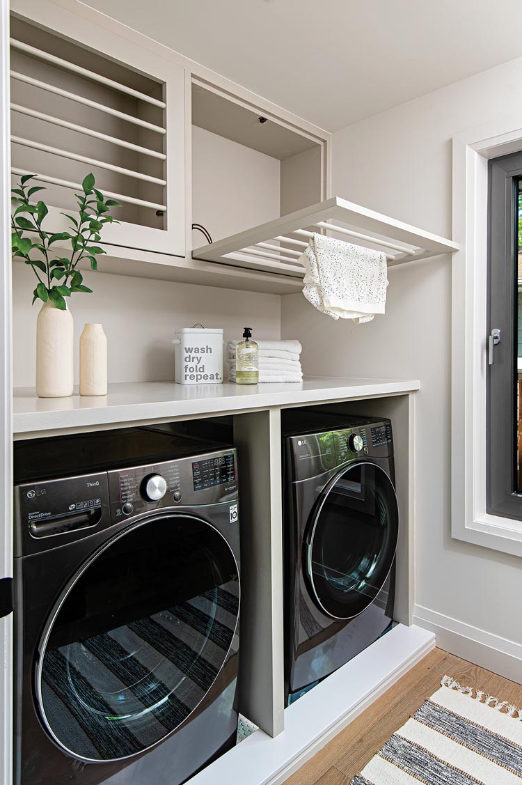laundry room with built in drying racks