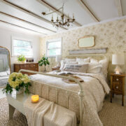 Bedroom with cream walls and candle burning for scents for the home
