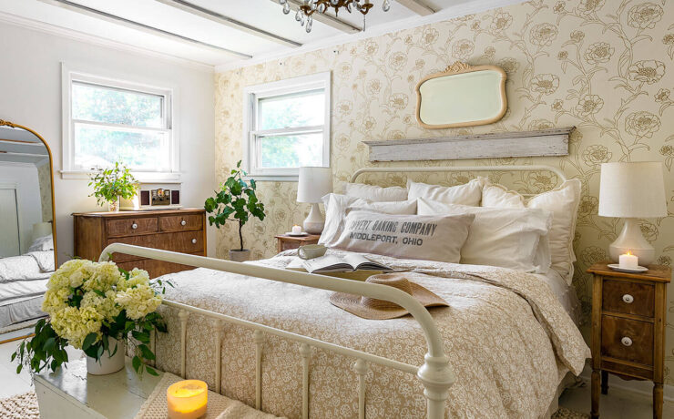 Bedroom with cream walls and candle burning for scents for the home