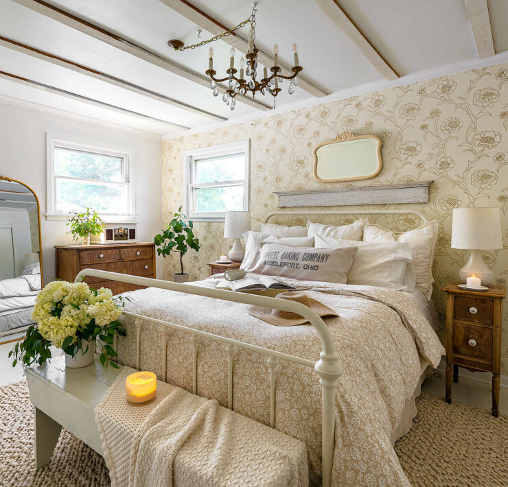 Bedroom with cream walls and candle burning for scents for the home