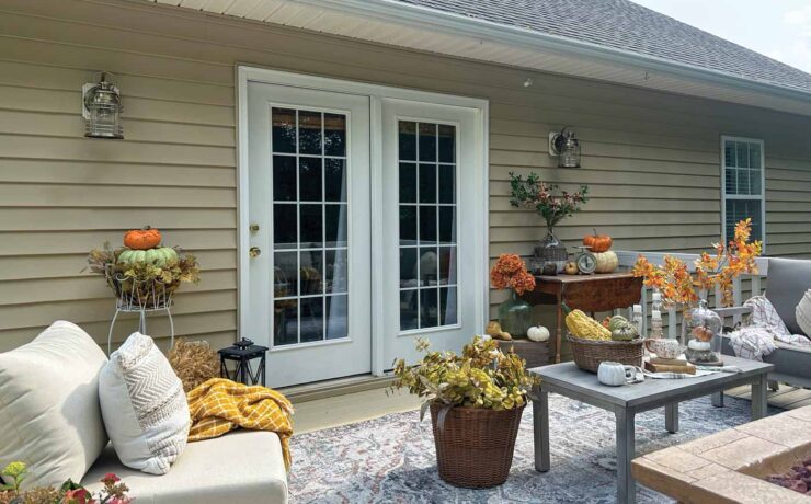 outdoor sconces on home exterior and outdoor living room on the patio