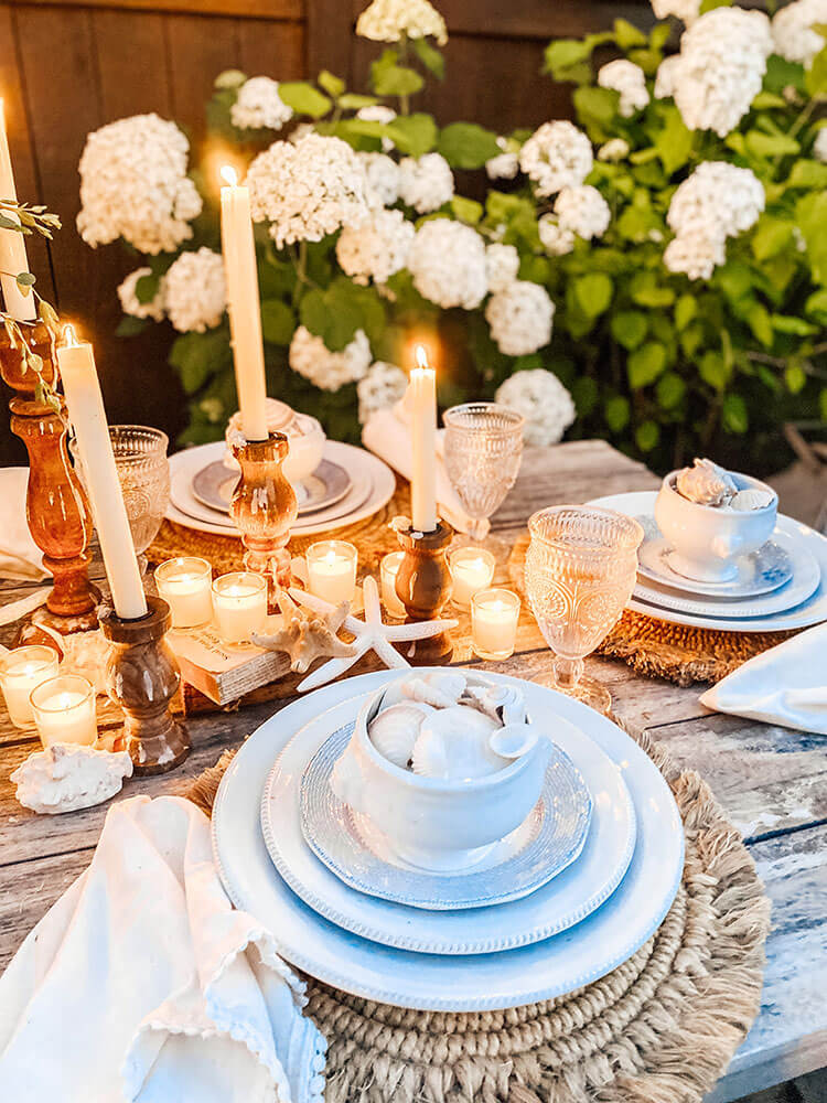 Outdoor tablescape with seashells