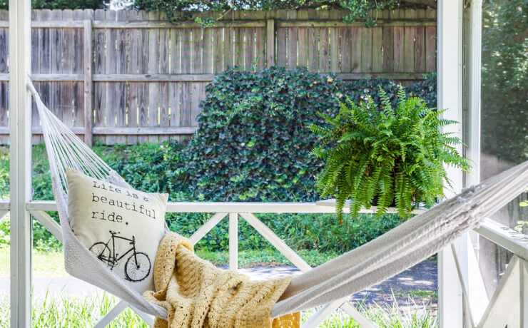 Sun porch with hammock and blanket, with tips to buy a farmhouse