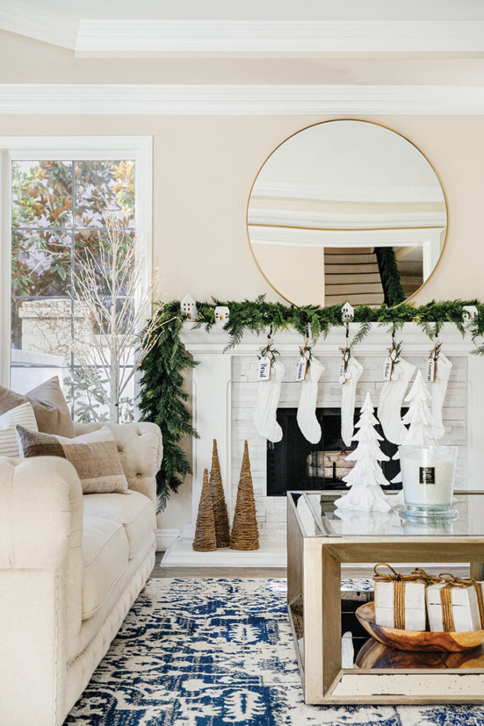 country Christmas fireplace and mantel with stockings and garland