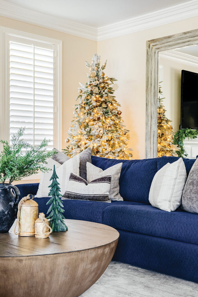 family room with flocked Christmas tree