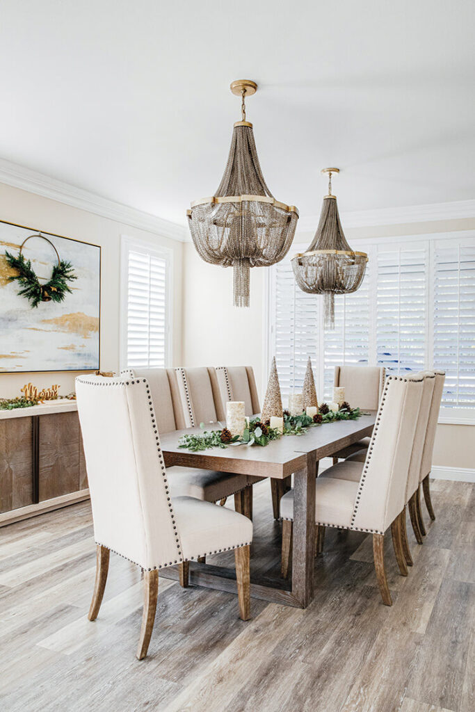 dining room with fresh greenery and pinecones for Christmas