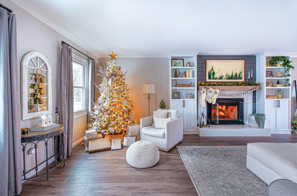 fireplace with ornament garland and large tree in DIY Christmas farmhouse