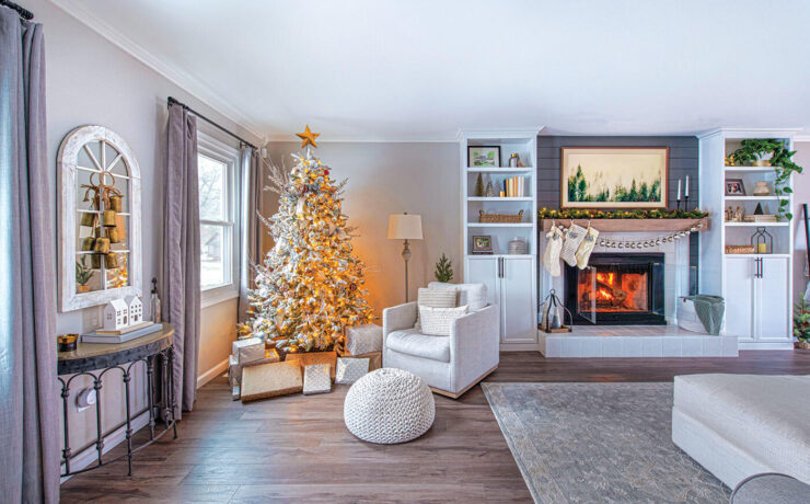 fireplace with ornament garland and large tree in DIY Christmas farmhouse