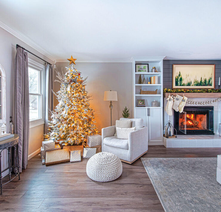 fireplace with ornament garland and large tree in DIY Christmas farmhouse