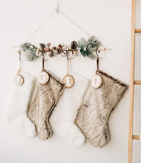 christmas stockings hanging on the wall