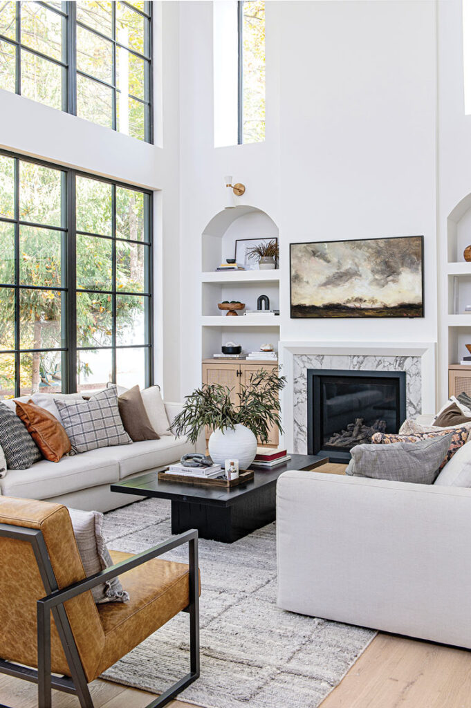 high ceiling and wall of windows in Ontario home living room