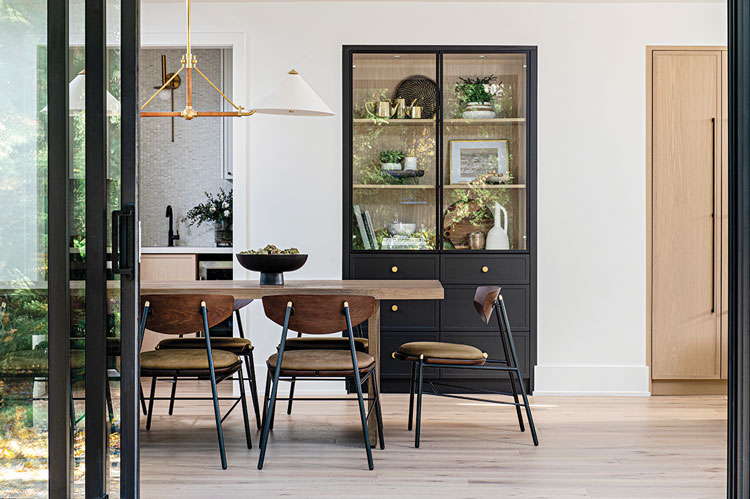 sliding door leading to dining room in modern farmhouse Ontario home