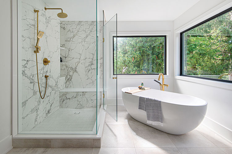 master bath with soaking tub and large walk in shower