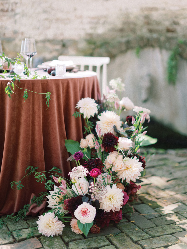 sweetheart table romantic tablescape with flower arrangement