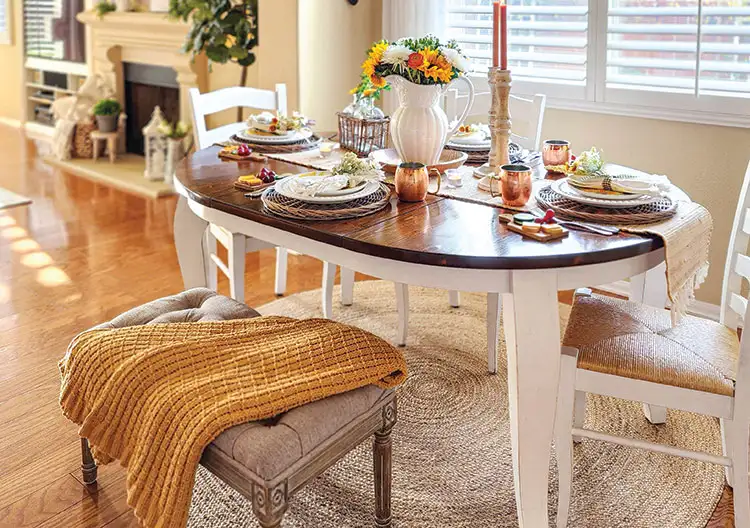 tablescape inspired by sunflowers with bouquet and copper mugs