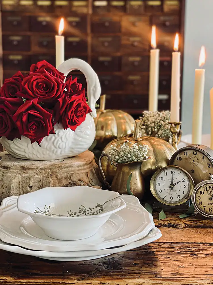 vintage clocks as part of elegant tablescape