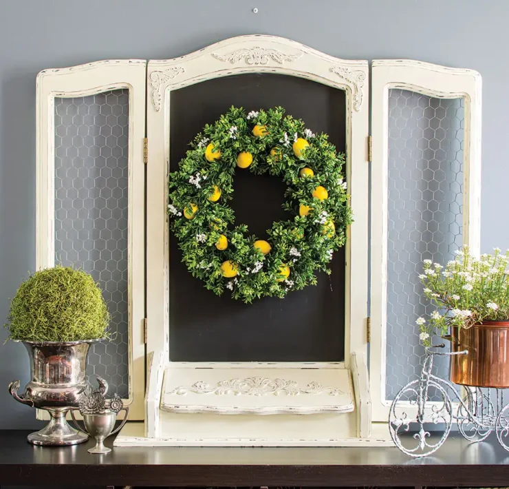 DIY lemon wreath on display in vignette