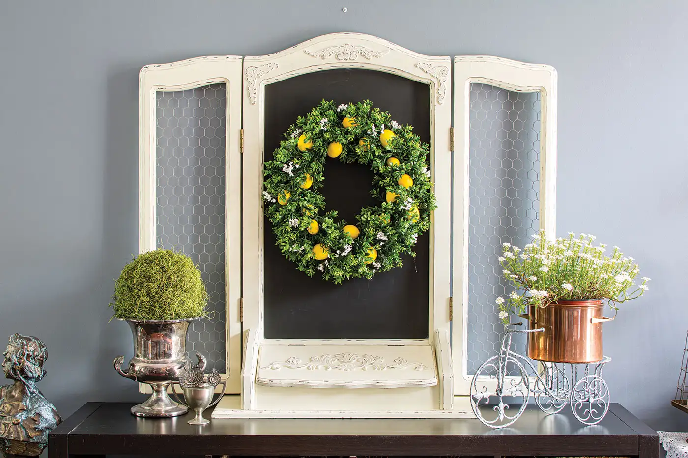 DIY lemon wreath on display in vignette