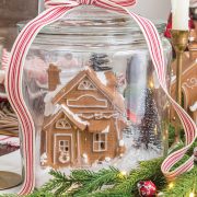 DIY Gingerbread Snow Globe Jar centerpiece of holiday tablescape