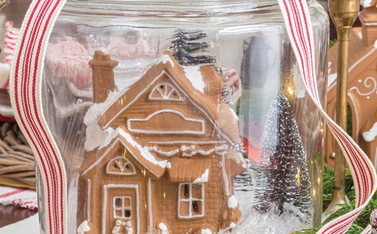 DIY Gingerbread Snow Globe Jar centerpiece of holiday tablescape