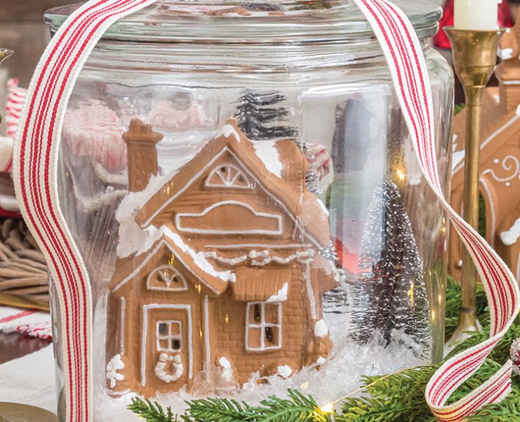 DIY Gingerbread Snow Globe Jar centerpiece of holiday tablescape