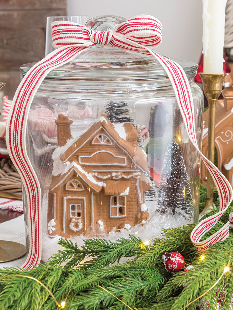 DIY Gingerbread Snow Globe Jar centerpiece of holiday tablescape