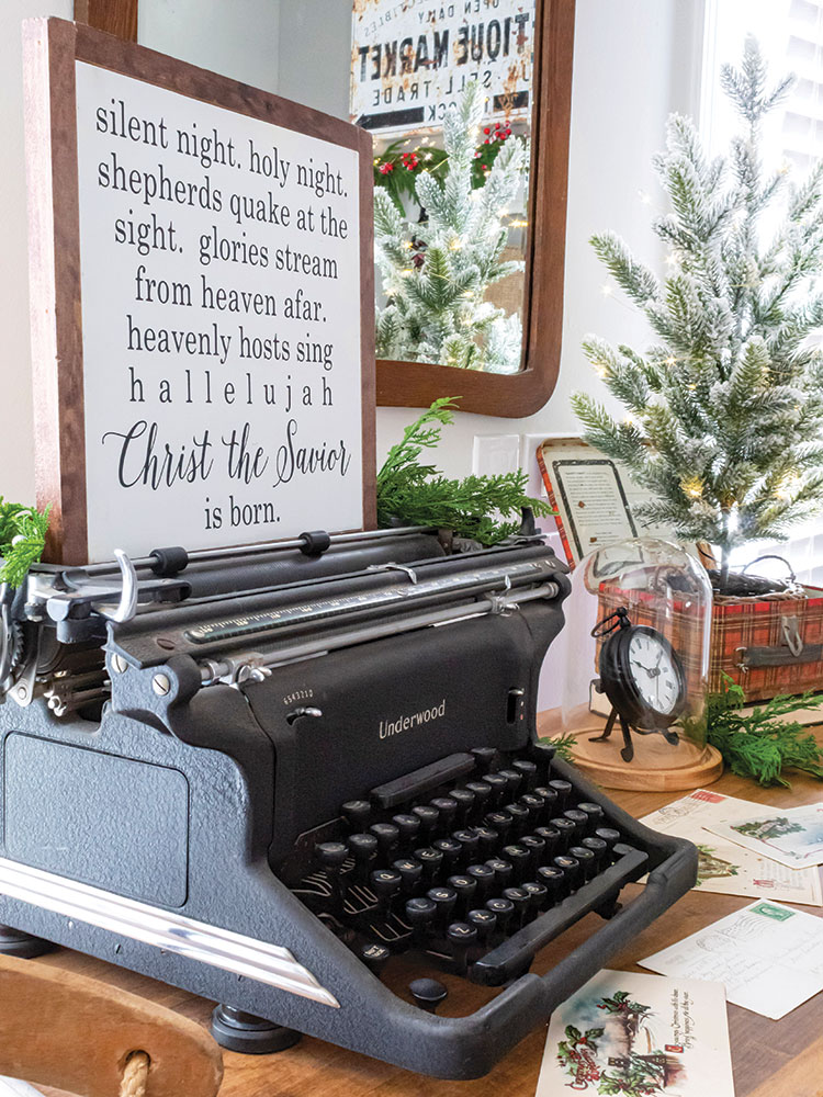 vintage Underwood typewriter and word art with lyrics to Silent Night forms holiday vignette