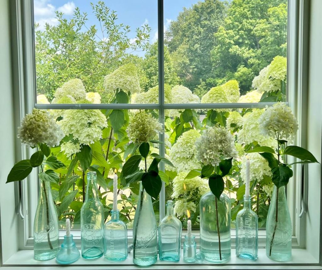 aqua glasses used as floral vases