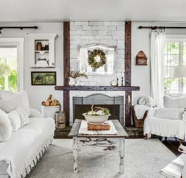 white living room with vintage furniture in California dream home