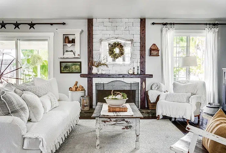 white living room with vintage furniture in California dream home