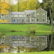 eyebrow windows on spacious New England farmhouse