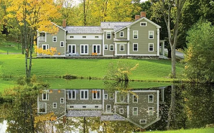 eyebrow windows on spacious New England farmhouse