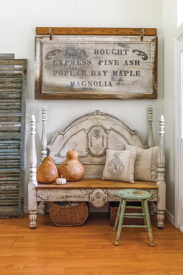 entryway bench made of vintage bedframe in Florida home decorated for fall