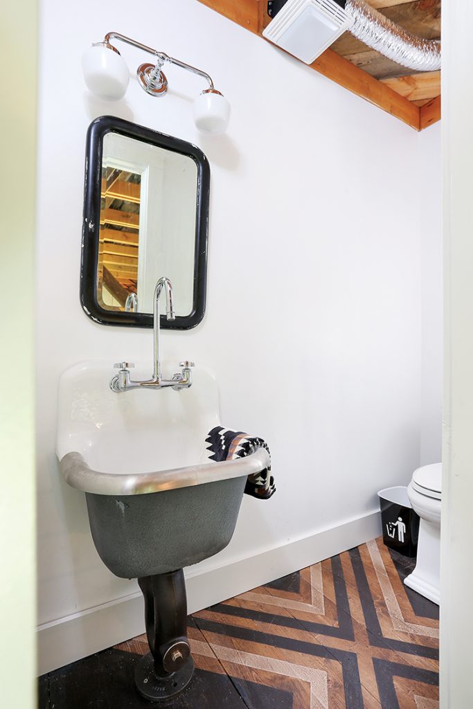 bathroom of renovated barn home with benefit of smart technology