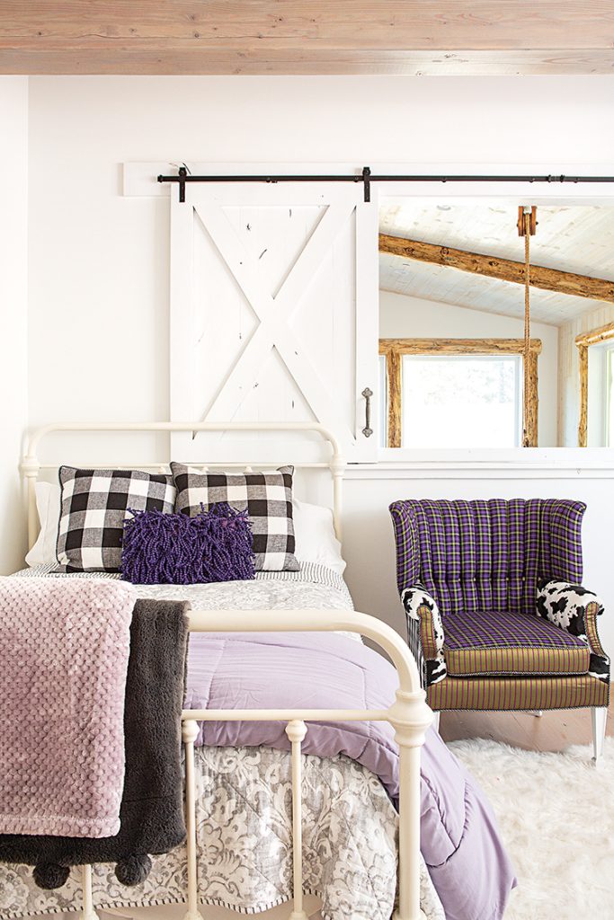 sliding barn door and twin sized bed in spacious Big Bear cabin