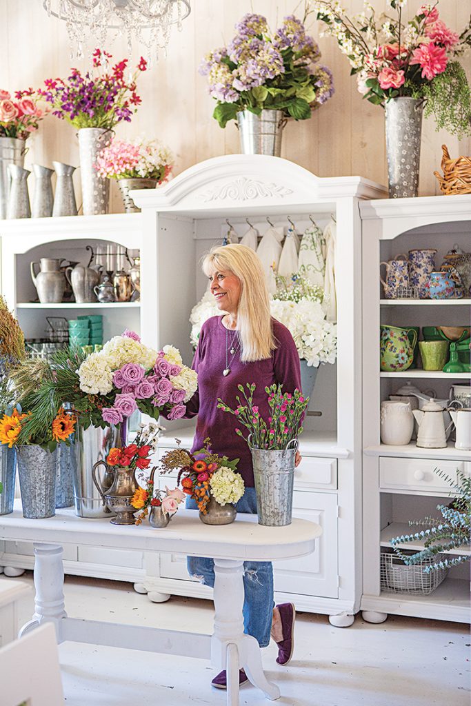 Janice Morrow among flowers in Big Bear