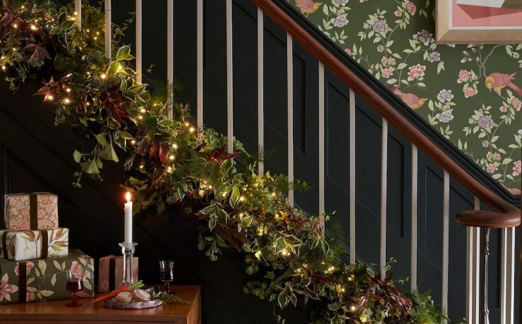 presents wrapped in extra wallpaper in home with dog