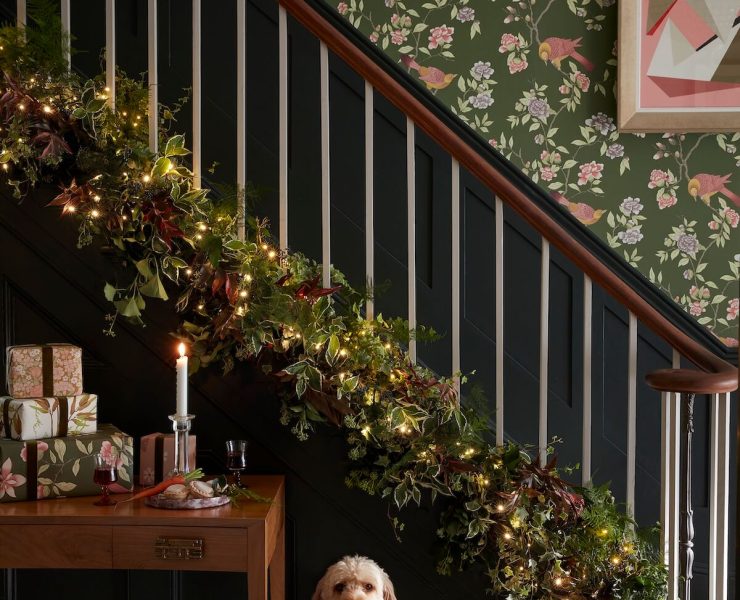 presents wrapped in extra wallpaper in home with dog