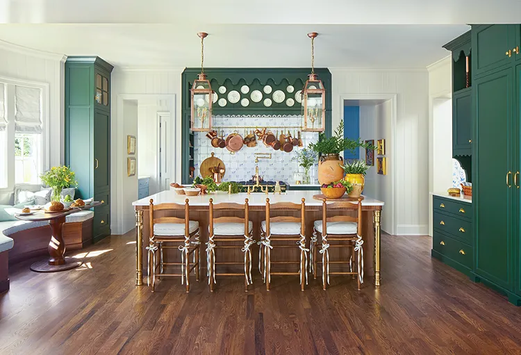 kitchen with hanging copper pots and decorative plates in Project House Utah