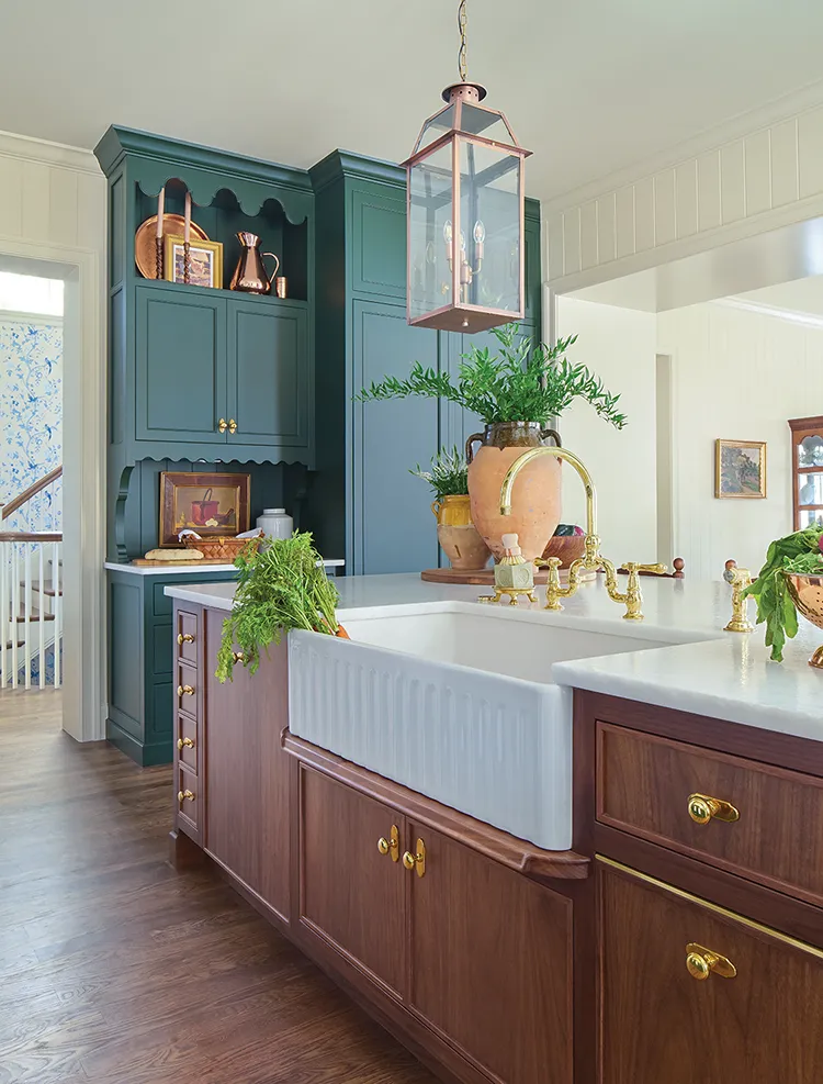 farmhouse style sink and deep green cabinetry with scalloped edges in Project House Utah