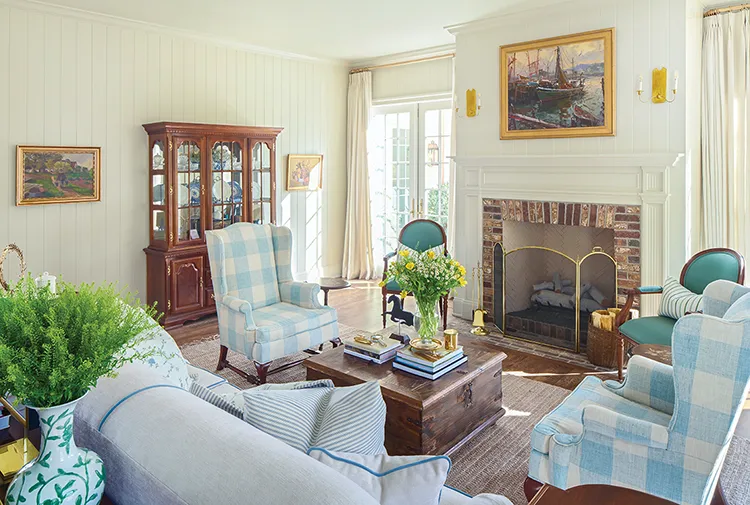 fireplace seating area with nautical painting in Project House Utah