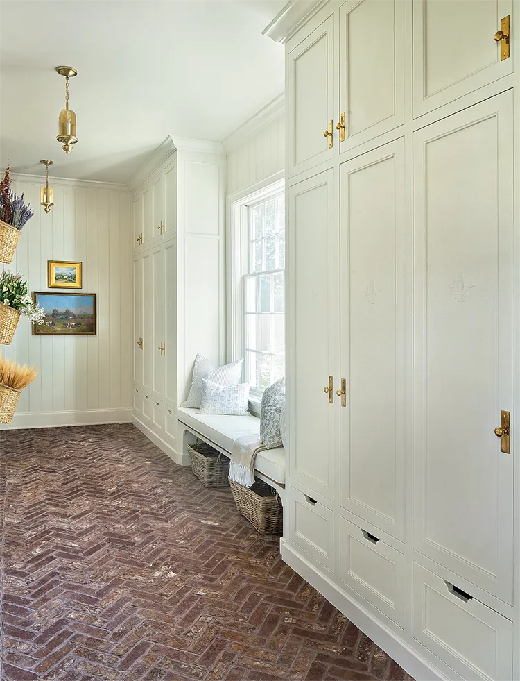 brick herringbone floor and floor to ceiling storage in Project House Utah entryway