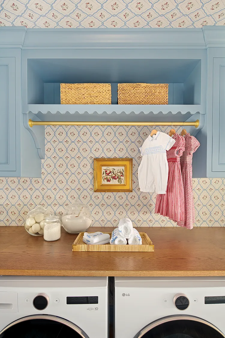 laundry room with powder blue shelves with scalloped edges