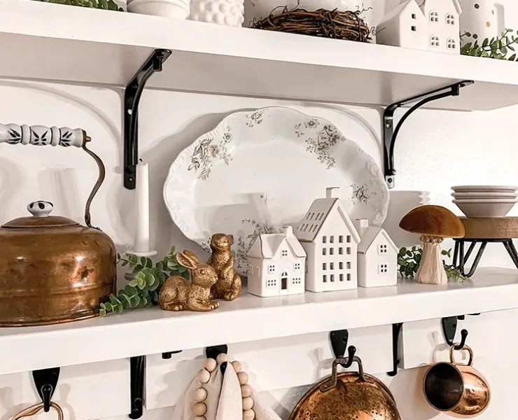 kitchen close up of exposed kitchen shelves with copper and white kitchenalia